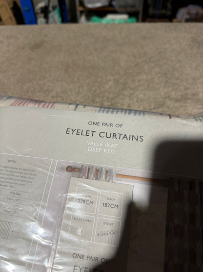 John Lewis Valle Ikat Print Pair Lined Eyelet Curtains, Deep Red, W228 x Drop 182cm